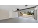 Clean garage with epoxy flooring and ample space for parking and storage at 567 E Wesley Ne Rd, Atlanta, GA 30305