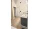 Well-lit bathroom featuring modern fixtures and ample counter space at 6921 Foxmoor Way, Douglasville, GA 30134