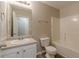 Bathroom featuring a vanity, commode, and shower-tub combo unit at 104 Sunflower Meadows Dr, Mcdonough, GA 30252