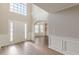 Elegant foyer with soaring ceilings, hardwood floors, and ample natural light at 104 Sunflower Meadows Dr, Mcdonough, GA 30252
