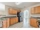 Spacious kitchen featuring oak cabinets, solid-surface counters and stainless appliances at 104 Sunflower Meadows Dr, Mcdonough, GA 30252
