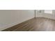 Bright, spacious sitting area with hardwood floors and wainscoting details at 104 Sunflower Meadows Dr, Mcdonough, GA 30252