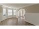 Sitting area with bay window, hardwood floors, and wainscoting details at 104 Sunflower Meadows Dr, Mcdonough, GA 30252