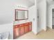 Bathroom featuring a double vanity and walk-in shower at 1869 Appaloosa Mill Ct, Buford, GA 30519
