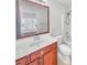 Bathroom featuring a bath and shower, vanity and mirror at 1869 Appaloosa Mill Ct, Buford, GA 30519