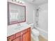 Bathroom featuring a bath and shower, vanity and mirror at 1869 Appaloosa Mill Ct, Buford, GA 30519