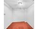 Empty bedroom with wooden floorboards and white walls at 1869 Appaloosa Mill Ct, Buford, GA 30519