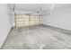 An open two-car garage at 1869 Appaloosa Mill Ct, Buford, GA 30519