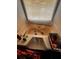 An alcove bathtub is surrounded by tile and features a window for natural light at 305 Savannah Pl, Douglasville, GA 30134