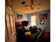 Comfortable bedroom featuring a window and art decorations at 305 Savannah Pl, Douglasville, GA 30134