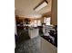 Kitchen featuring tile floors, island and lots of cabinet space at 305 Savannah Pl, Douglasville, GA 30134