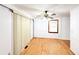 Bright dining room featuring wood floors, neutral walls, and a window for natural light at 3276 Pin Oak Cir, Doraville, GA 30340
