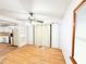 Bright dining room featuring hardwood floors, ceiling fan, and sliding door to back at 3276 Pin Oak Cir, Doraville, GA 30340