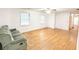 Spacious living room featuring hardwood floors, neutral walls, and abundant natural light at 3276 Pin Oak Cir, Doraville, GA 30340