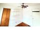 This office area features hardwood floors, windows, and storage shelving at 3276 Pin Oak Cir, Doraville, GA 30340