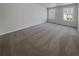 Large main bedroom with large windows at 3677 Utoy Sw Dr, Atlanta, GA 30331