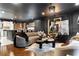 Modern living room featuring stylish decor, unique lighting and elegant furnishings at 1388 Willow Sw Trl, Atlanta, GA 30311