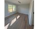 Dining room with wood floors, natural light, and chandelier lighting at 3825 Emerson St, Marietta, GA 30062