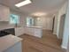 Bright kitchen featuring modern appliances, white cabinets, and a large kitchen island at 3825 Emerson St, Marietta, GA 30062