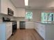 Modern kitchen with stainless steel appliances and ample counter space at 3825 Emerson St, Marietta, GA 30062
