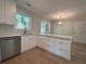 Beautiful kitchen with modern appliances, white cabinets, and a large kitchen island at 3825 Emerson St, Marietta, GA 30062
