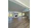 Spacious living room features a stone fireplace, wood floors, and large windows at 3825 Emerson St, Marietta, GA 30062