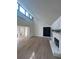 Living room showcases the brick fireplace, wood floors, and high ceilings at 3825 Emerson St, Marietta, GA 30062