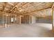 Large unfinished basement with exposed beams and concrete floors, offering a blank canvas for creating additional living space at 5424 Gallagher Ct, Powder Springs, GA 30127
