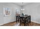 Cozy dining area with natural light, perfect for Gathering meals or entertaining guests at 5915 Pinnacle View Rd, Cumming, GA 30040