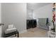Practical laundry room with modern washer and dryer, ample space, and well-organized storage at 5915 Pinnacle View Rd, Cumming, GA 30040