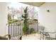 Cozy balcony with seating and wrought iron railing overlooking the neighborhood at 970 Sidney Marcus Ne Blvd # 1208, Atlanta, GA 30324