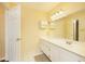 Well-lit bathroom with a long vanity, ample counter space, and large mirror at 970 Sidney Marcus Ne Blvd # 1208, Atlanta, GA 30324