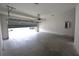 Spacious garage with an automatic door offers ample storage and parking at 2551 Bear Mountain St, Lithonia, GA 30058