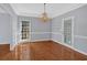 Dining room featuring hardwood floors and a decorative chandelier at 3699 Fowler Rdg, Douglasville, GA 30135