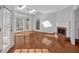 Spacious living room with skylights, fireplace, and beautiful hardwood floors at 3699 Fowler Rdg, Douglasville, GA 30135