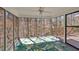 Screened in porch with view of deck and mature trees at 3699 Fowler Rdg, Douglasville, GA 30135