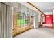 Bright and airy living room with a bay window overlooking the lush backyard at 50 Stonington Pl, Marietta, GA 30068