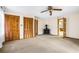 Living room with a black fireplace, carpet, and closet at 50 Stonington Pl, Marietta, GA 30068