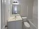 A clean and simple bathroom with a tub, toilet and vanity at 890 Abbotts Mill Ct # 75, Duluth, GA 30097