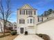 Charming exterior with a well-manicured lawn and an attached garage at 890 Abbotts Mill Ct # 75, Duluth, GA 30097