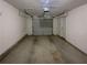 Spacious garage with ample room for vehicle and storage at 890 Abbotts Mill Ct # 75, Duluth, GA 30097