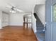 Welcoming foyer with a staircase and hardwood floors leading to the living areas at 10067 Freeman Ct, Jonesboro, GA 30236