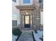 Inviting front entrance with glass paneled door, sidelights, and decorative brick accents at 3419 In Bloom Way, Auburn, GA 30011