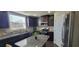 Kitchen featuring stainless steel appliances, granite countertops, and ample cabinet space at 3419 In Bloom Way, Auburn, GA 30011