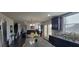 Open-concept living space showcasing the kitchen, dining area, and living room, perfect for entertaining at 3419 In Bloom Way, Auburn, GA 30011