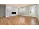 Open living space with hardwood floors, modern fireplace, and updated trim details, perfect for entertaining at 3470 Glenwood Rd, Decatur, GA 30032