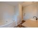 Bathroom featuring a soaking tub, shower, and vanity at 4096 Mistymorn Ln, Powder Springs, GA 30127