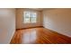 Bedroom featuring natural light and hardwood floors at 4096 Mistymorn Ln, Powder Springs, GA 30127