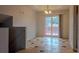 Bright dining area with sliding glass doors leading to a deck at 4096 Mistymorn Ln, Powder Springs, GA 30127