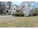 Charming two-story home with a two-car garage and inviting red porch steps at 4096 Mistymorn Ln, Powder Springs, GA 30127
